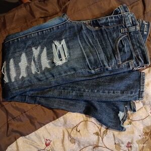 Distressed Blue Jeans